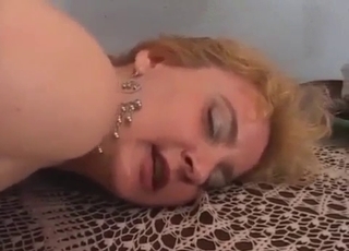 Doggy style banging for a leathery MILF